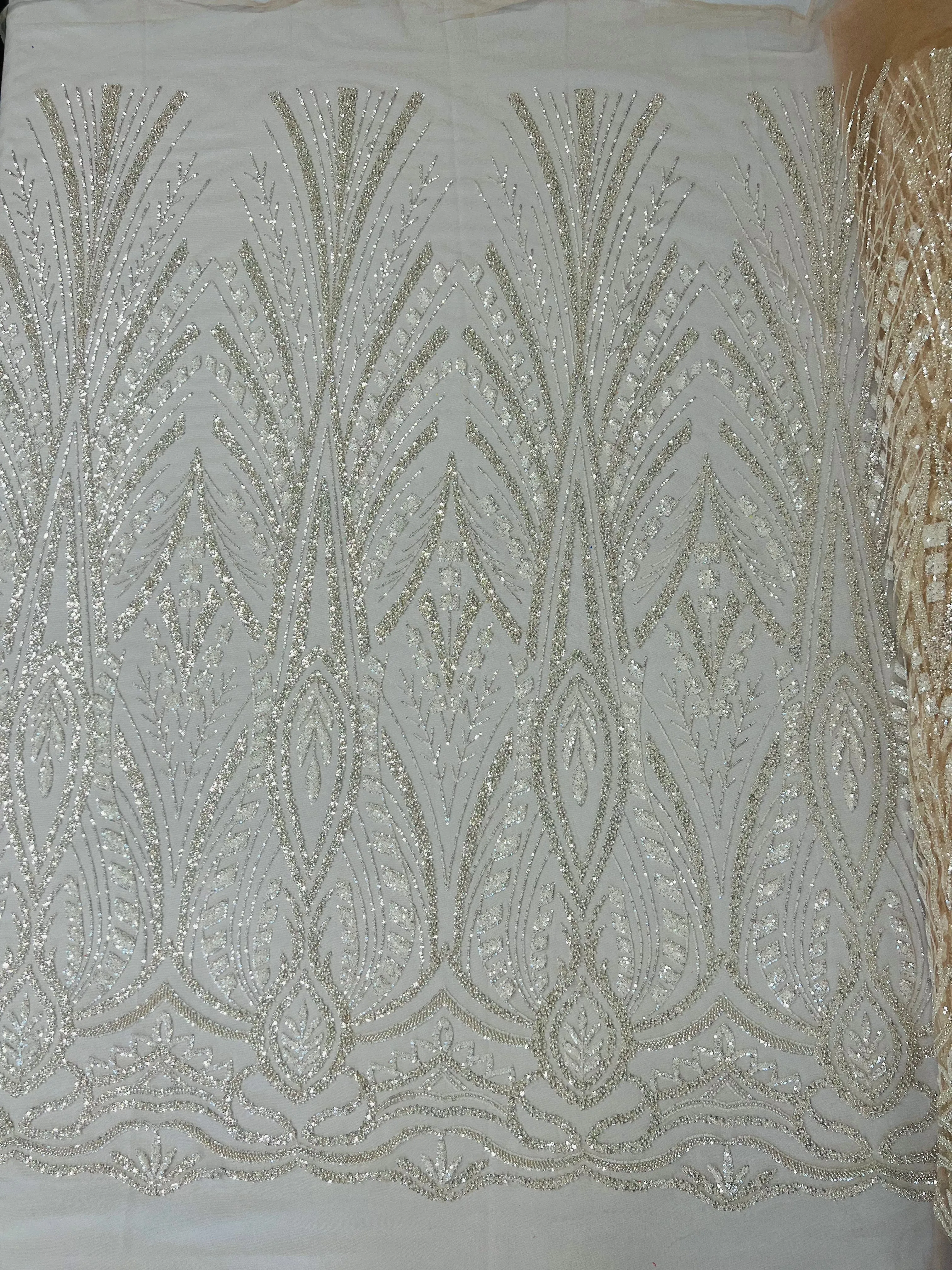 New damask embroider and heavy beaded on a mesh lace fabric-sold by the yard