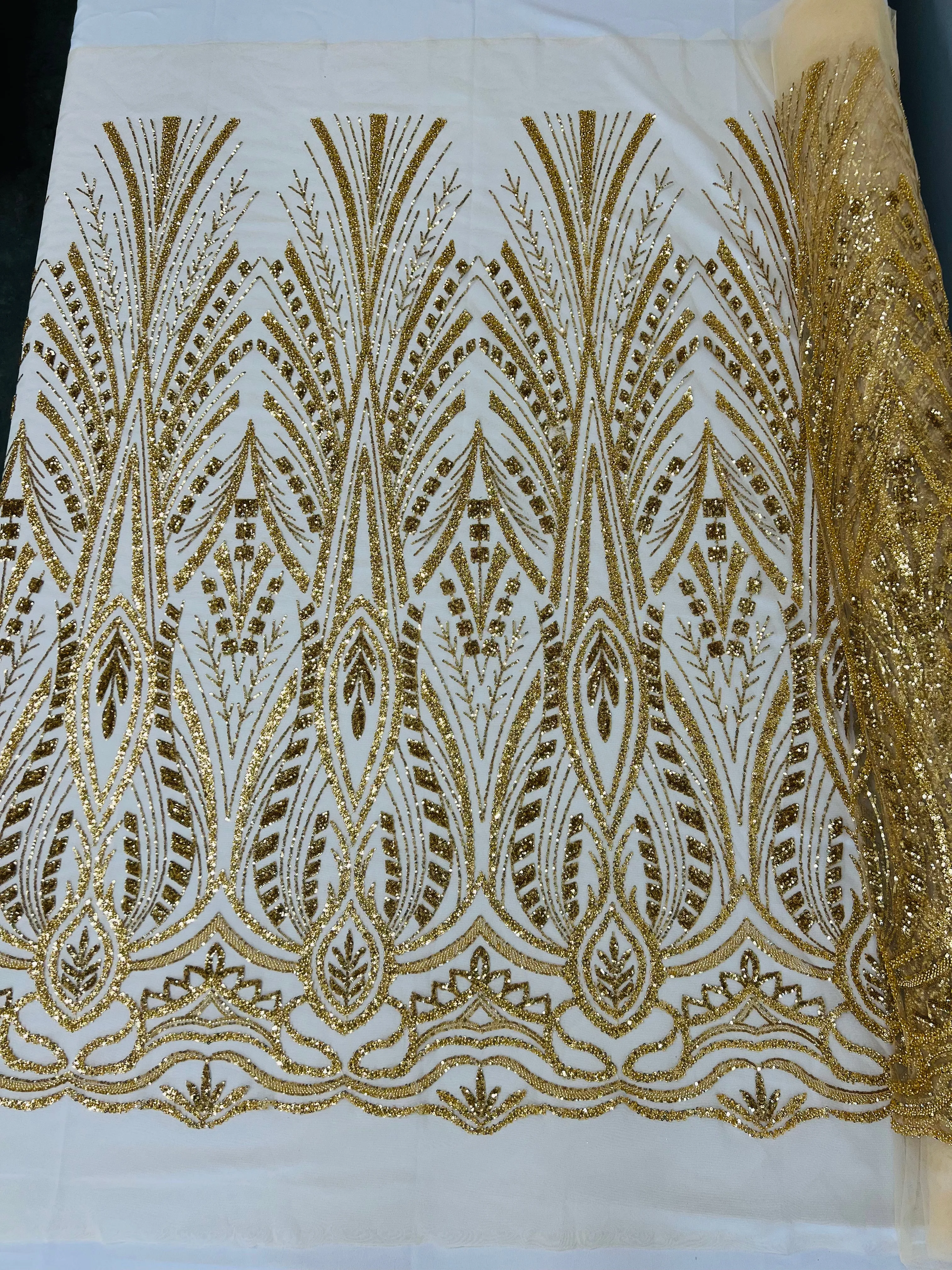 New damask embroider and heavy beaded on a mesh lace fabric-sold by the yard